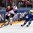 PRAGUE, CZECH REPUBLIC - MAY 4: Latvia's Roberts Bukarts #71 and Sweden's Mattias Ekholm #14 battle for the puck during preliminary round action at the 2015 IIHF Ice Hockey World Championship. (Photo by Andre Ringuette/HHOF-IIHF Images)

